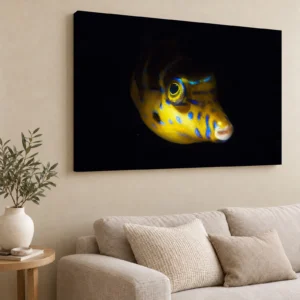 Large blue-spotted toby canvas print on a living room wall above a linen sofa