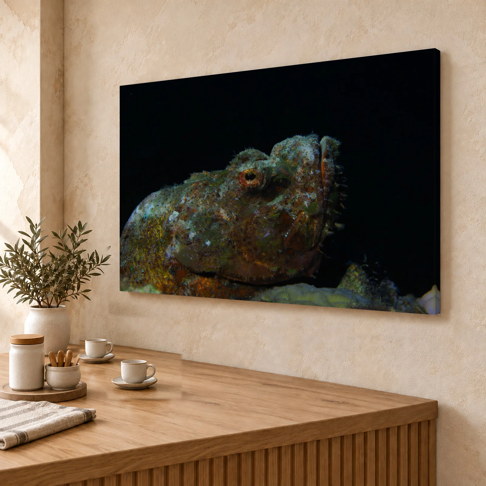 Large false stonefish canvas print on a café wall above a wooden counter