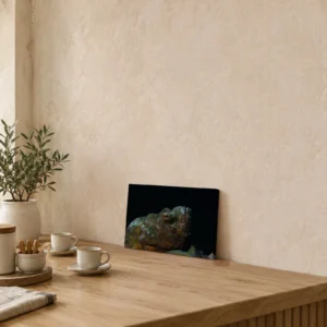 Small false stonefish canvas print on a wooden counter, leaning against the wall