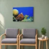 Medium octopus reef canvas, 30 × 20 in (76 × 51 cm), in a doctor's waiting room above two padded chairs, with a mug on the side table